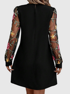 Ellis | Women's Dress with Plunging Neckline and Sheer Sleeves